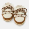 Evx Braune Mules aus Lammfell Evx Braune Mules aus Lammfell