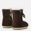Evx Stiefel aus dunkelbraunem Wildleder und Lammfell Evx Stiefel aus dunkelbraunem Wildleder und Lammfell