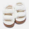 Weiße Sandalen aus Lammfell